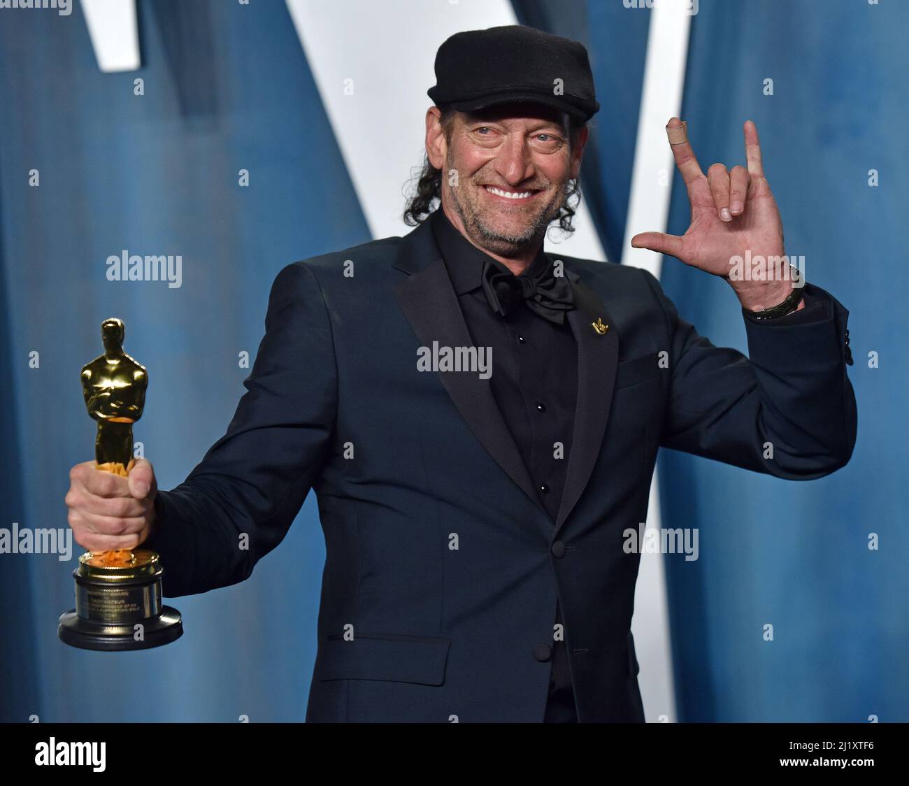 Beverly Hills, United States. 28th Mar, 2022. Troy Kotsur holds his