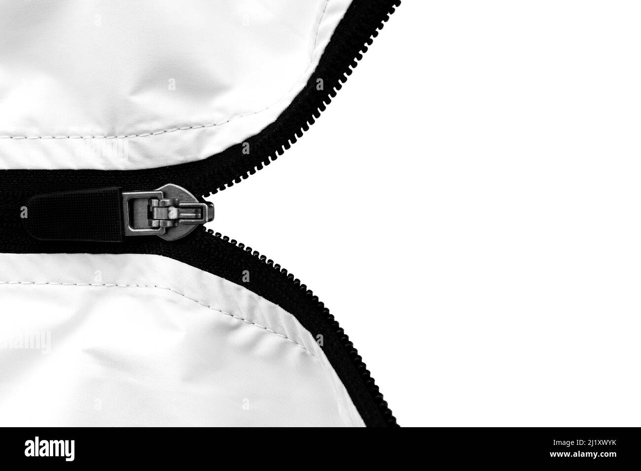 Zip lock on clothes with a place for an inscription or logo. Lock with lightning on a white