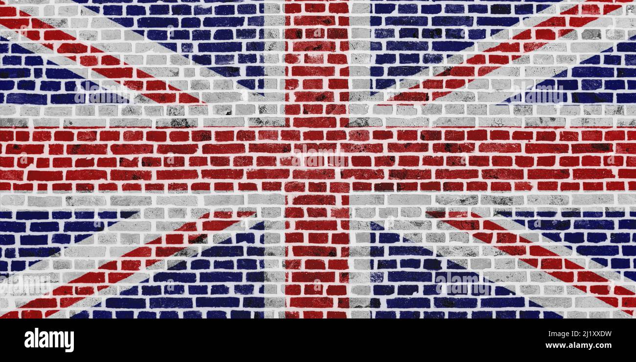 Close-up on a brick wall with the flag of the UK painted on it Stock ...