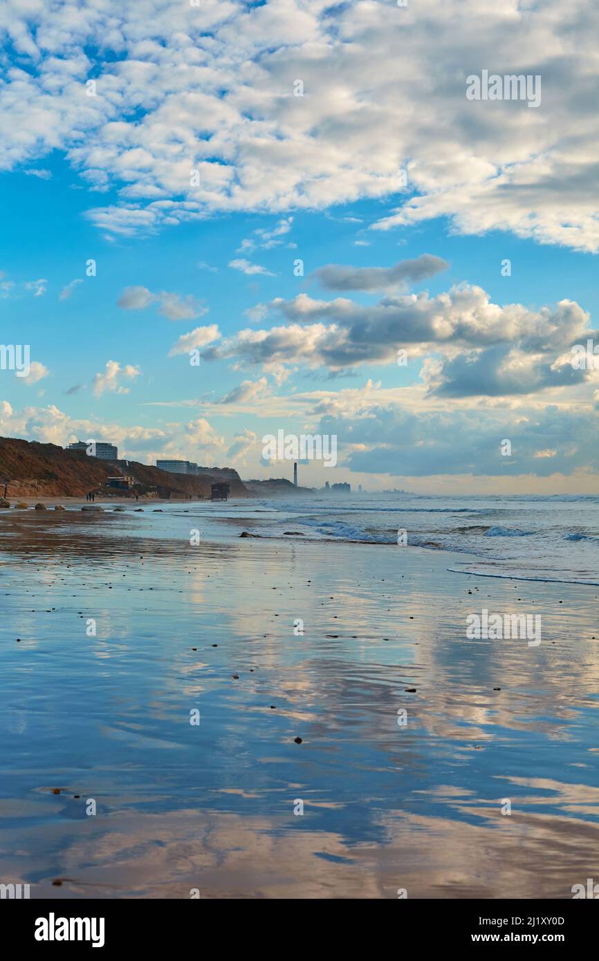 Coast. Seascape with sky reflection in the water Stock Photo - Alamy