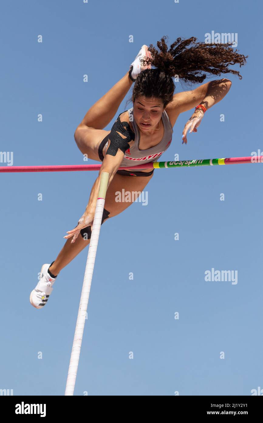 Gabriela Leon of Louisville clears a height in the pole vault during the 94th Clyde Littlefield