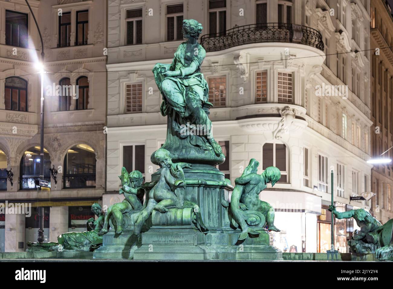 Vienna, Austria - November 26, 2010: bronce Providentia Fountain in vienna by night. Stock Photo