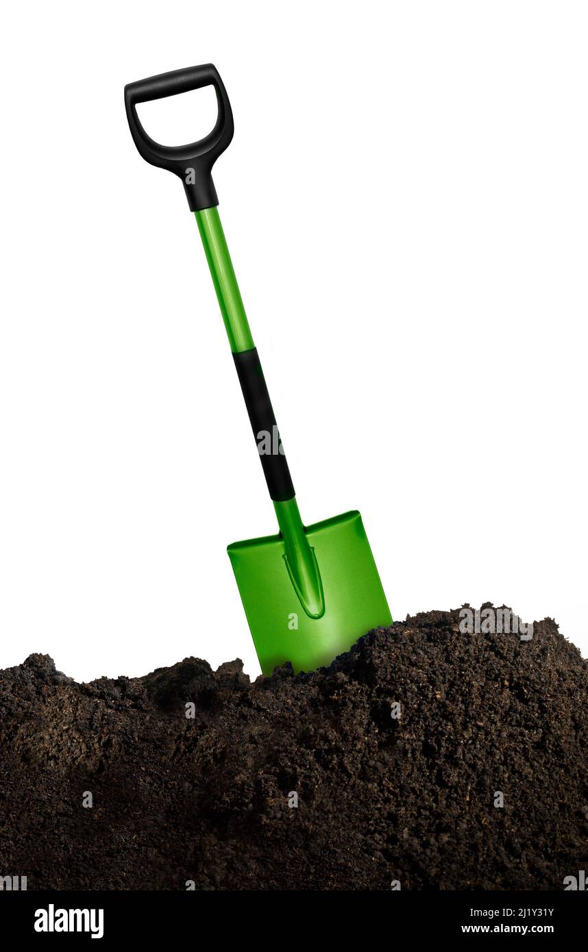 a pile of soil with a shovel, isolated on a white background Stock