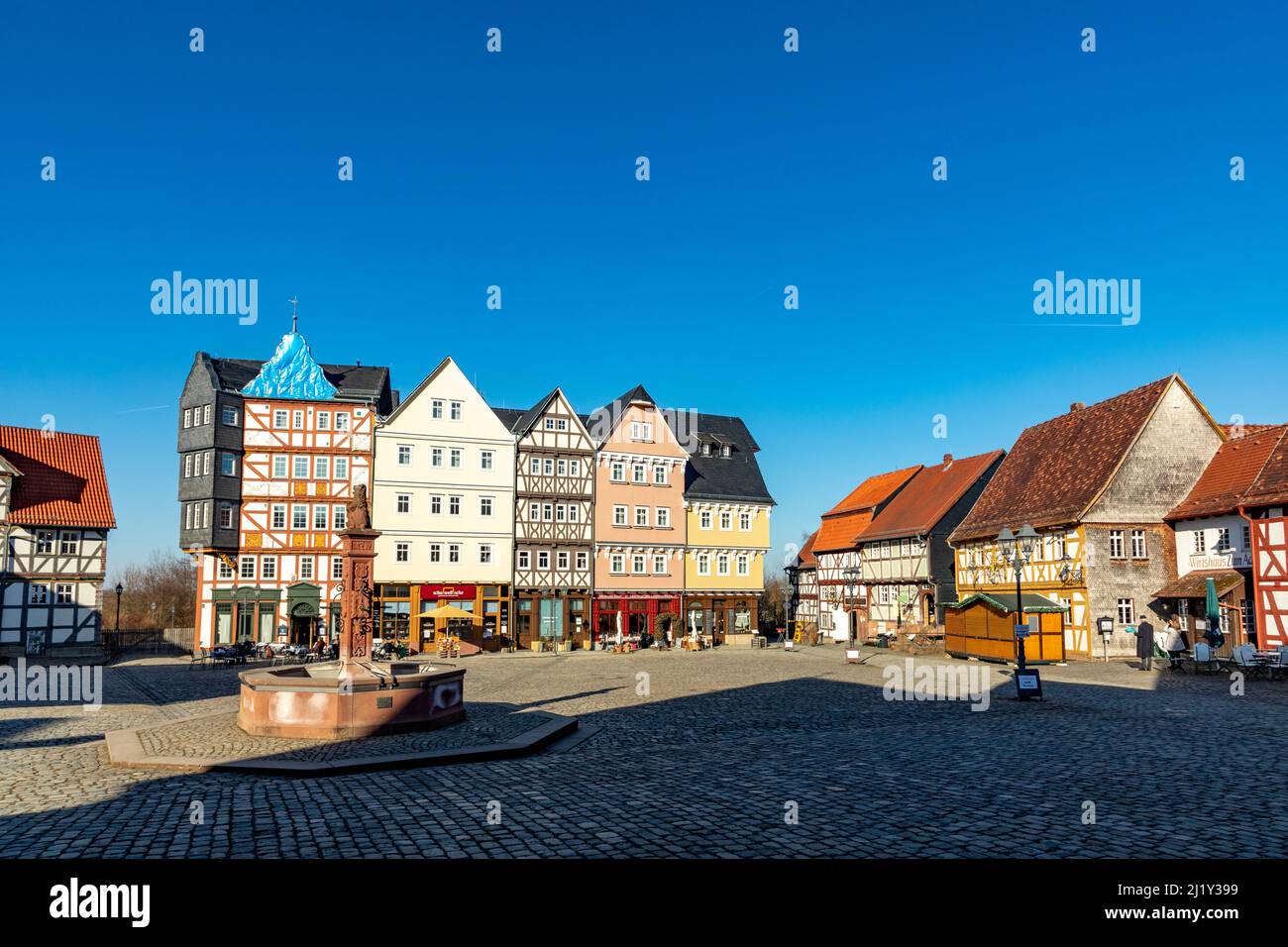 Neu Anspach, Germany - March 10, 2022:  market place at Hessenpark in Neu Anspach. Since 1974, more than 100 endangered buildings have been re-erected Stock Photo