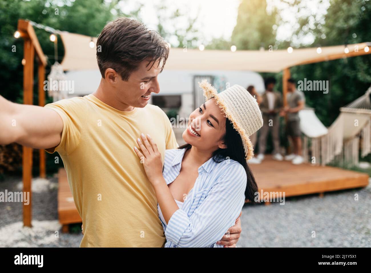 Happy affectionate young couple camper van hi-res stock photography and ...