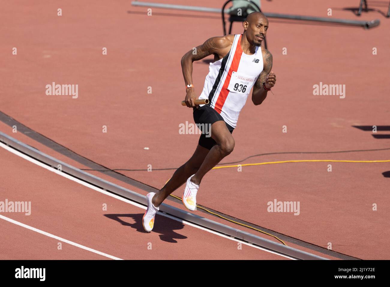 Vernon Norwood of Tiger Olympians runs the 4 x 400 meter relay during
