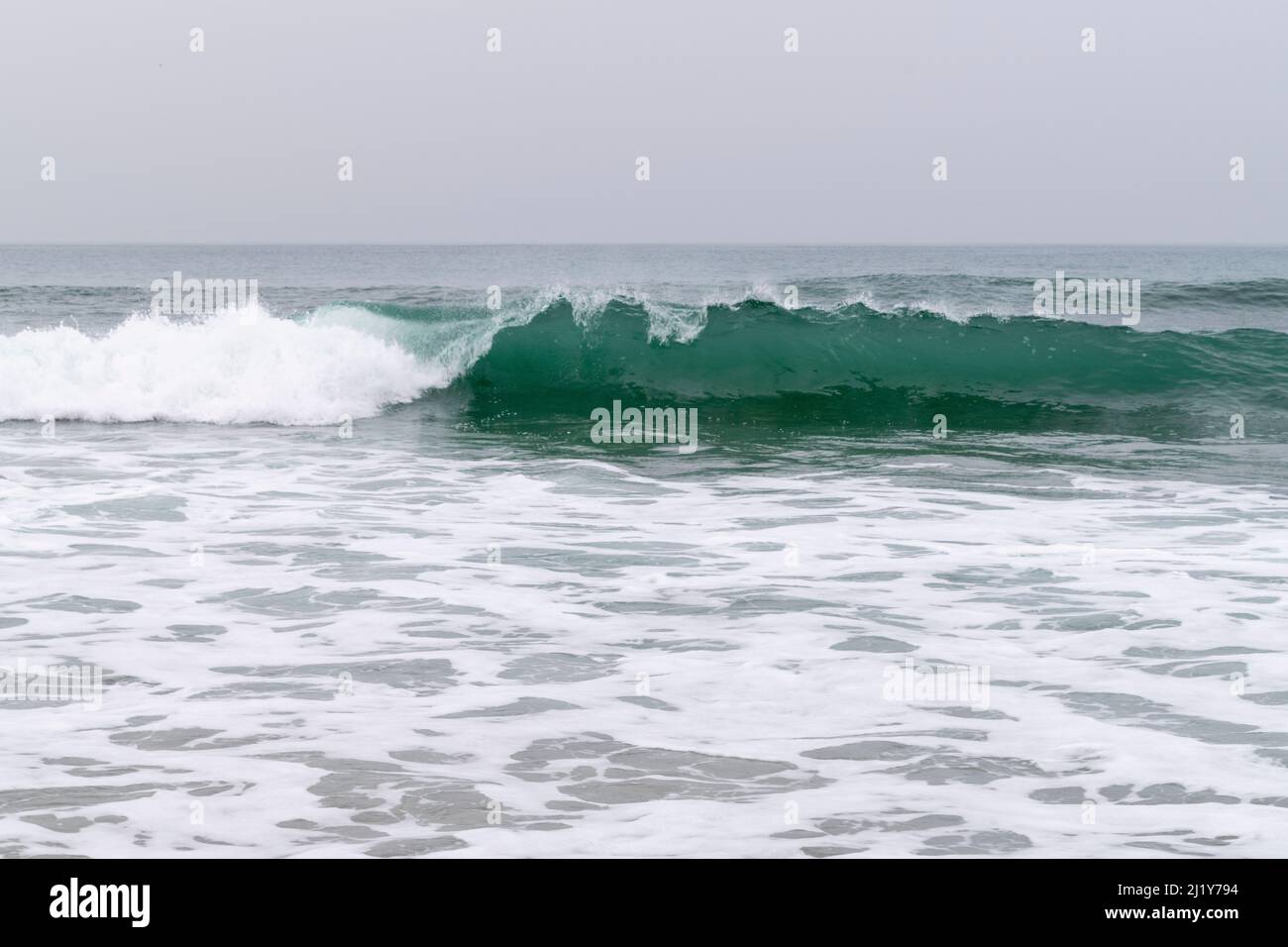 Surfing spot for right waves, face of the wave and wave pocket. Teaching surf wave directions. Surf trajectory study on beach breaks. Hurricane signs. Stock Photo