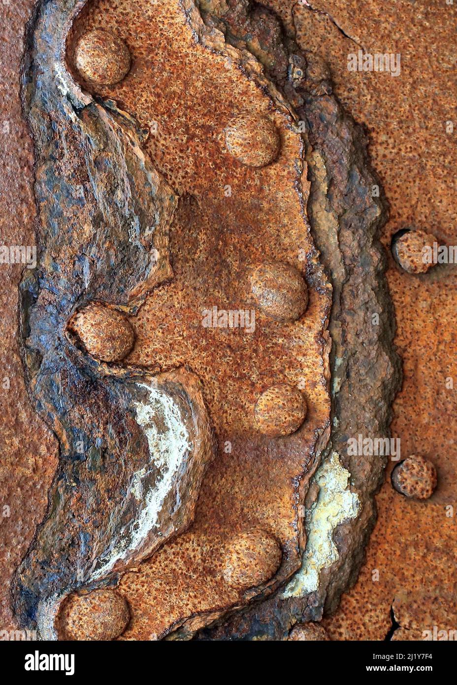 Wabi-Sabi a Japenese culture of the natures passage of time showing beauty in the art of imperfection and impermamence, this image is rusted metal and Stock Photo