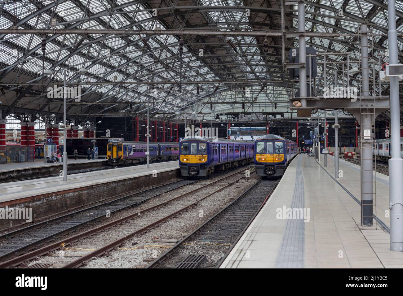 Northern rail class 319 electric multiple unit trains 319376 / 319377 at  Liverpool Lime Street  railway station with class 156 diesel 156460 (left) Stock Photo