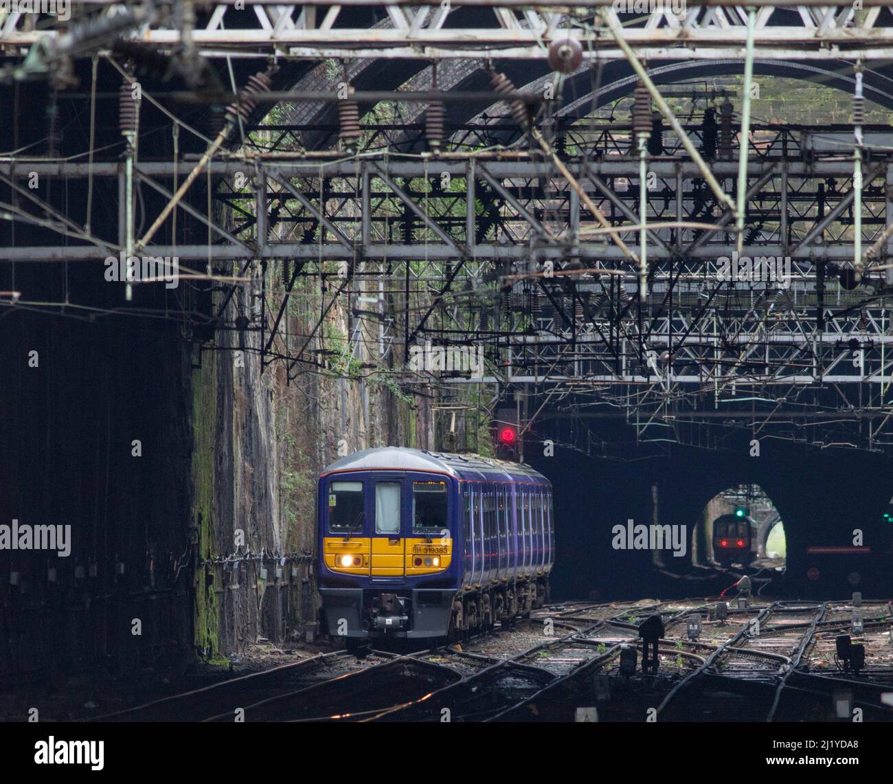 Northern Rail class 319 electric commuter train 319383 approaching  Liverpool Lime Street  running through Edge Hill cutting Stock Photo