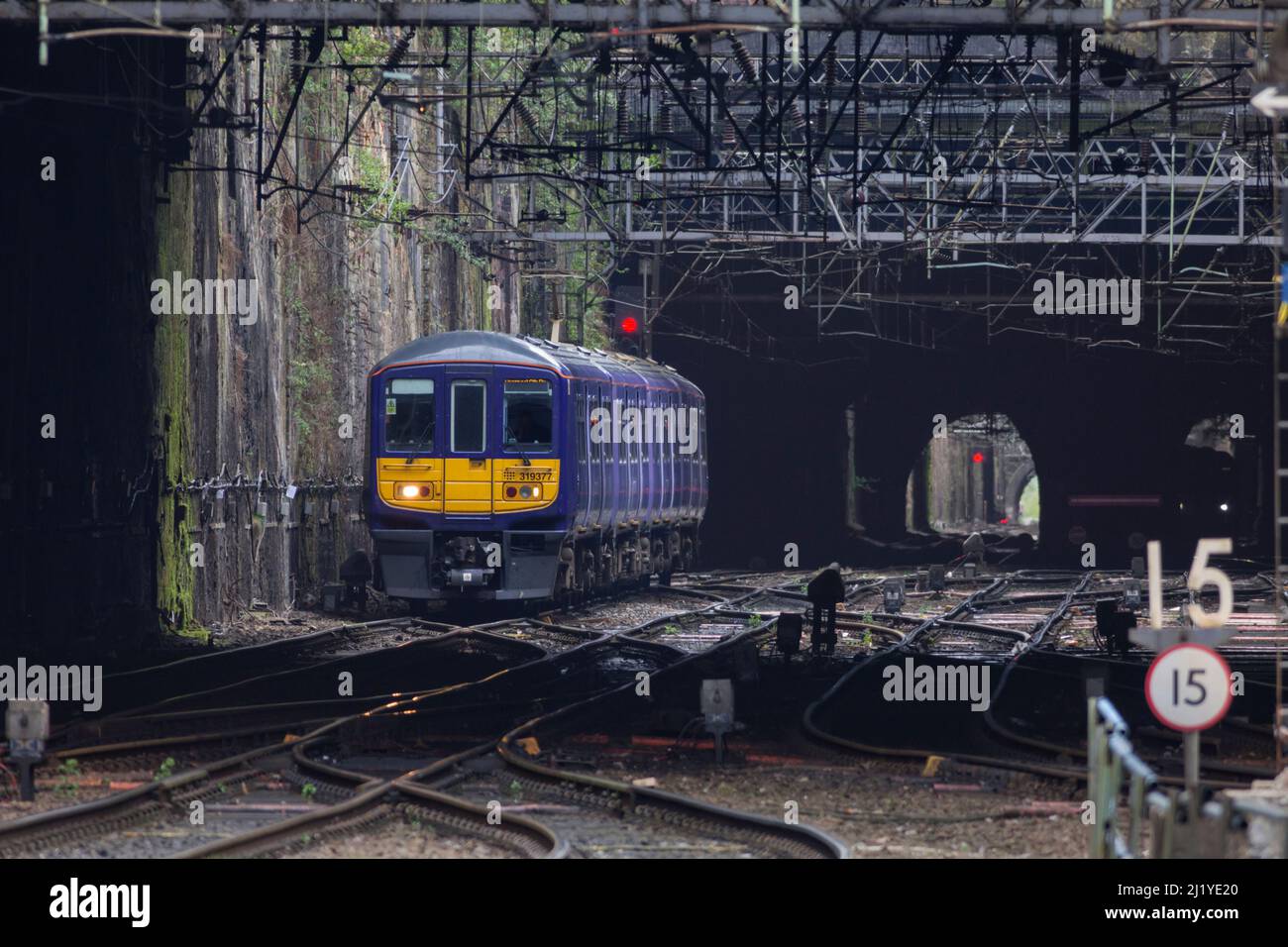 Northern Rail class 319 electric commuter train 319377 approaching  Liverpool Lime Street  running through Edge Hill cutting Stock Photo