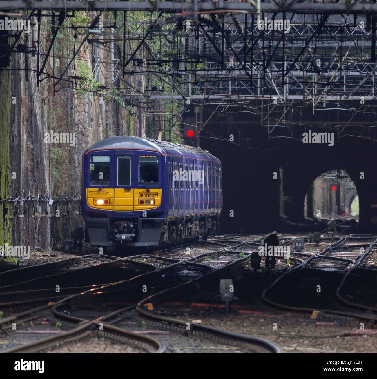 Northern Rail class 319 electric commuter train 319377 approaching  Liverpool Lime Street  running through Edge Hill cutting Stock Photo