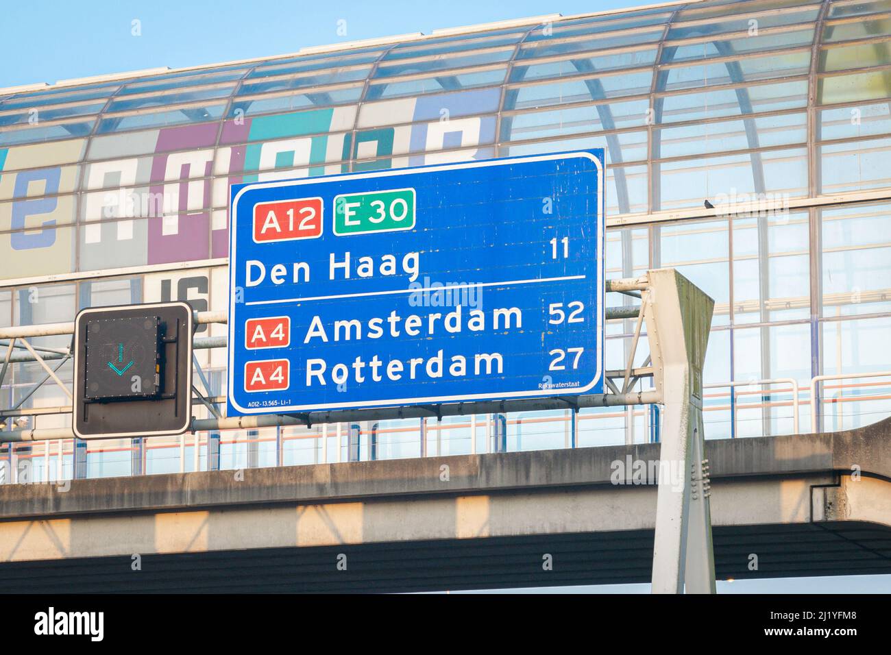 Traffic sign with distances to the three largest cities in the Netherlands Amsterdam, Rotterdam
