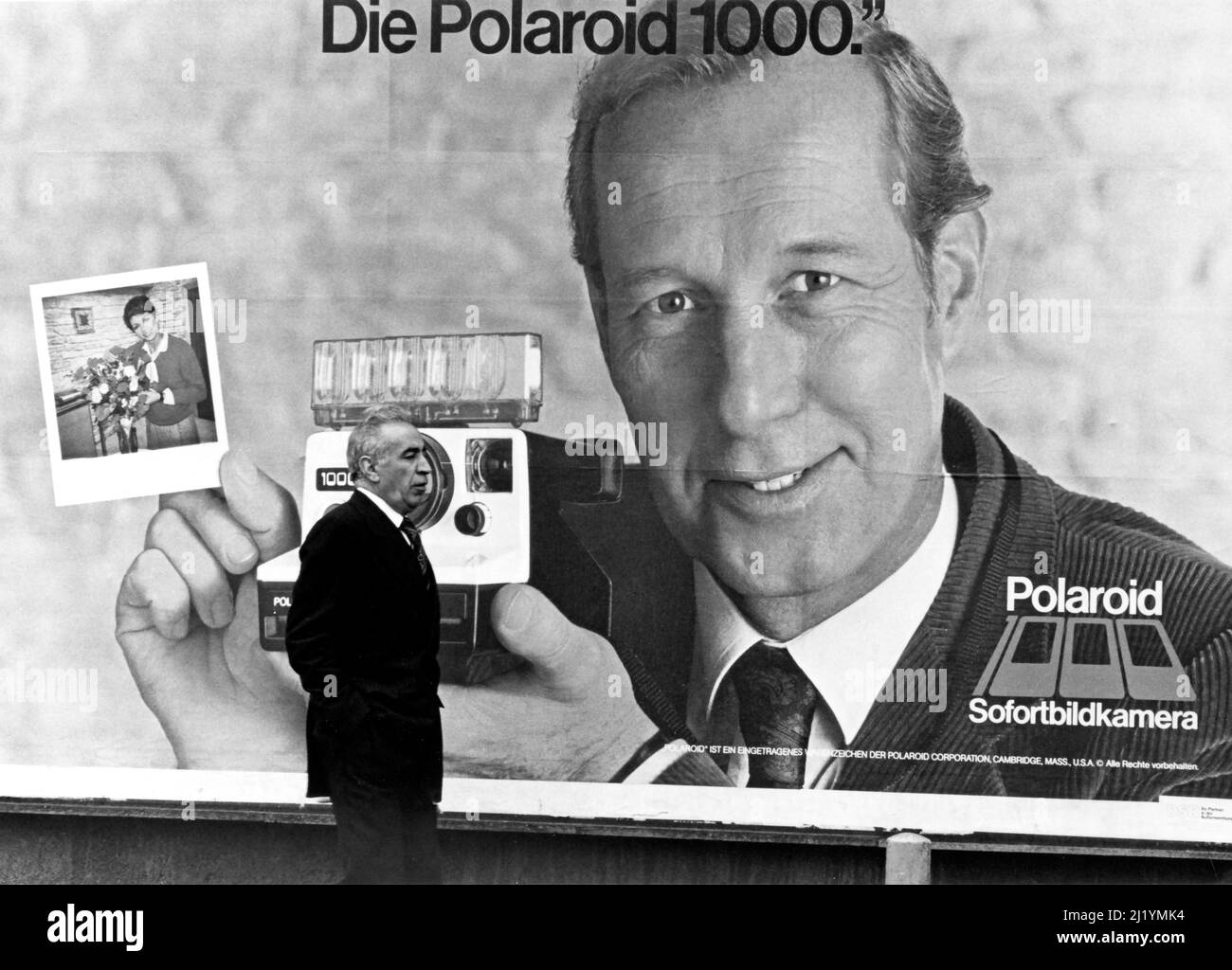 Outdoor advertising poster on street in Frankfurt, Germany for Polariod 1000 camera circa 1979 Stock Photo