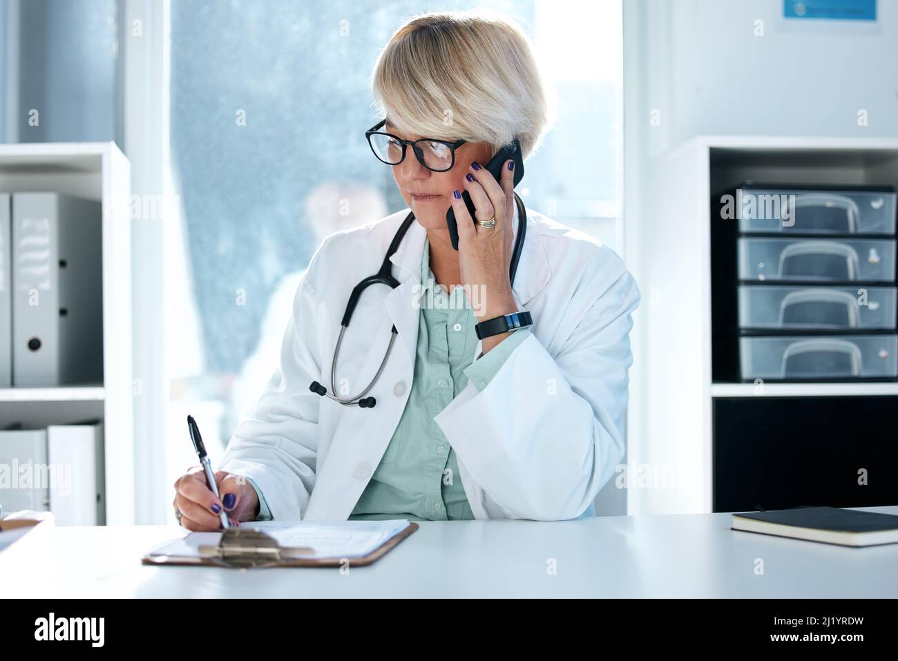 Wear the white coat with dignity and pride. Shot of a female doctor