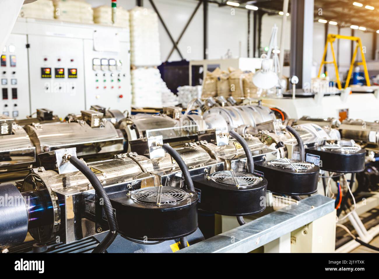 with extruders for producing plastic pipes. High speed