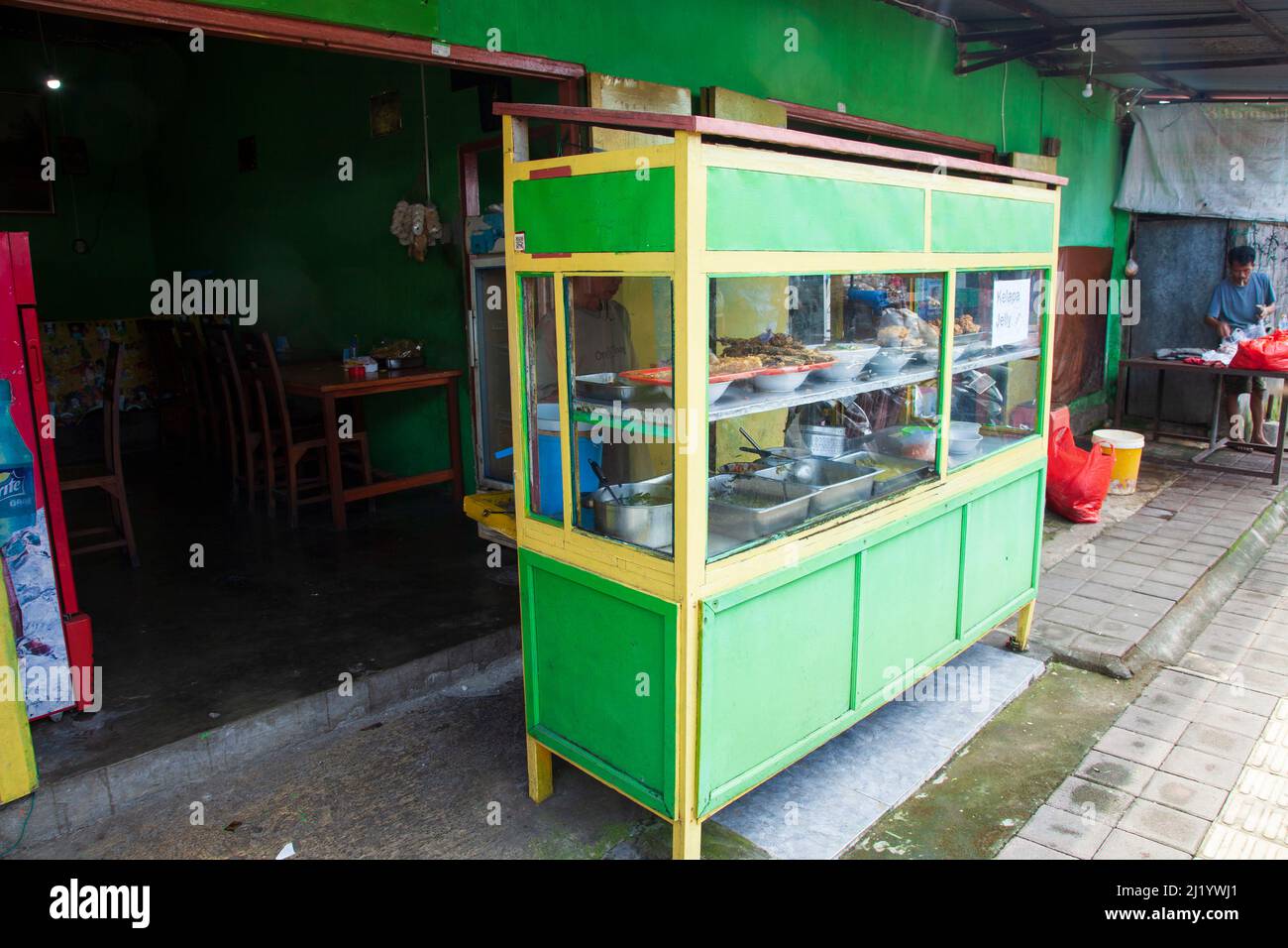 A green coloured street food restaurant in Sukawati, Bali, Indonesia. Stock Photo