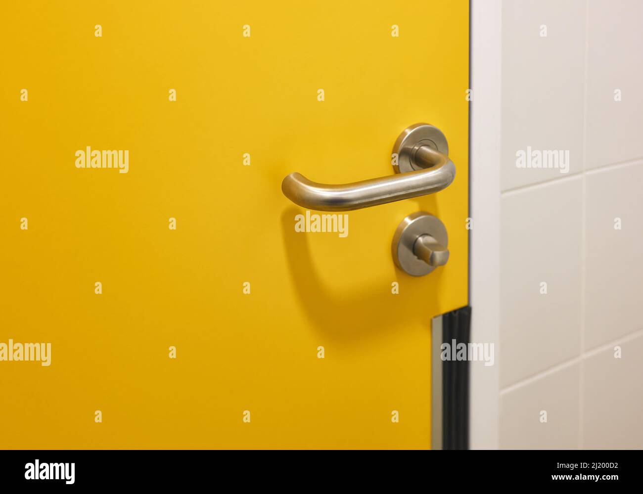 detail of a door handle in a public restroom Stock Photo Alamy