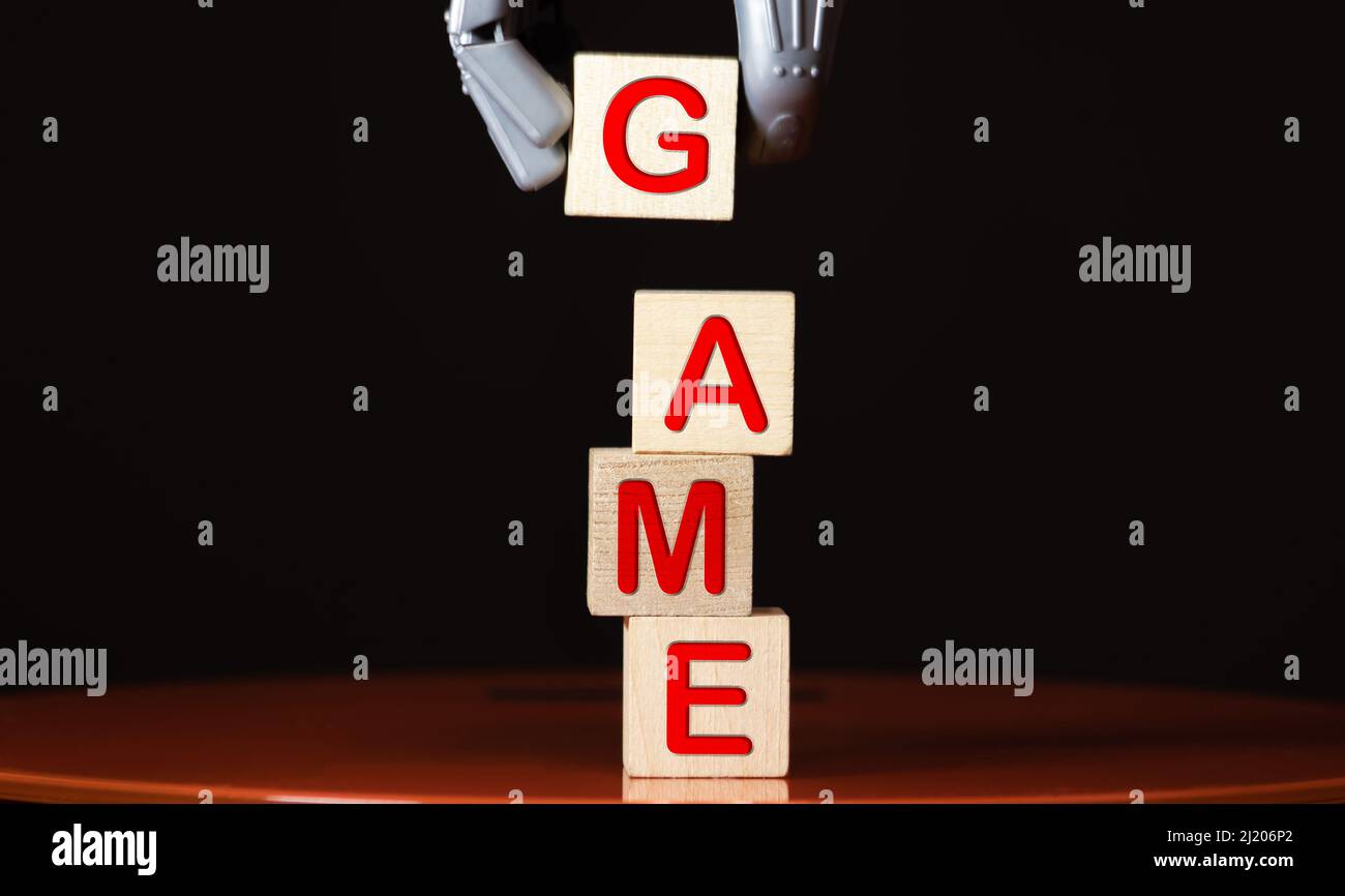 Game word written with different colored letter blocks arranged on a ...