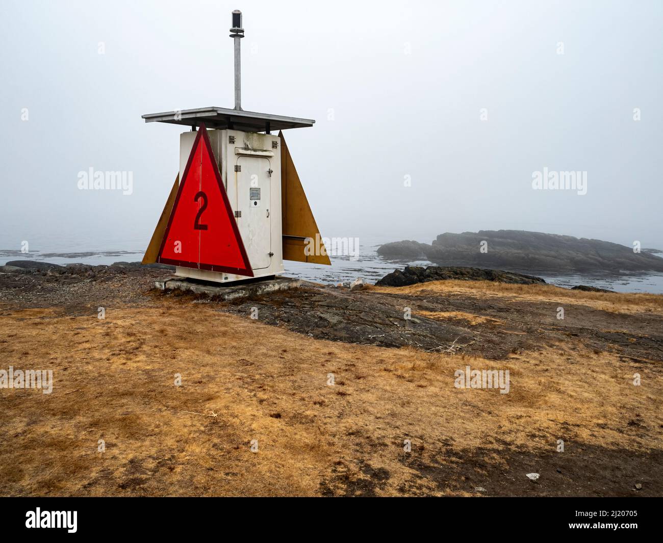 WA21190-00...WASHINGTON - A USGS Day Marker located on Iceberg Point on a foggy day at the southern end of Lopez Island. Stock Photo