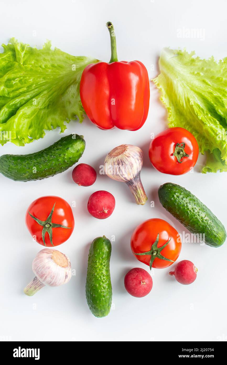 Assorted fresh vegetables on a white background. Diet food concept ...