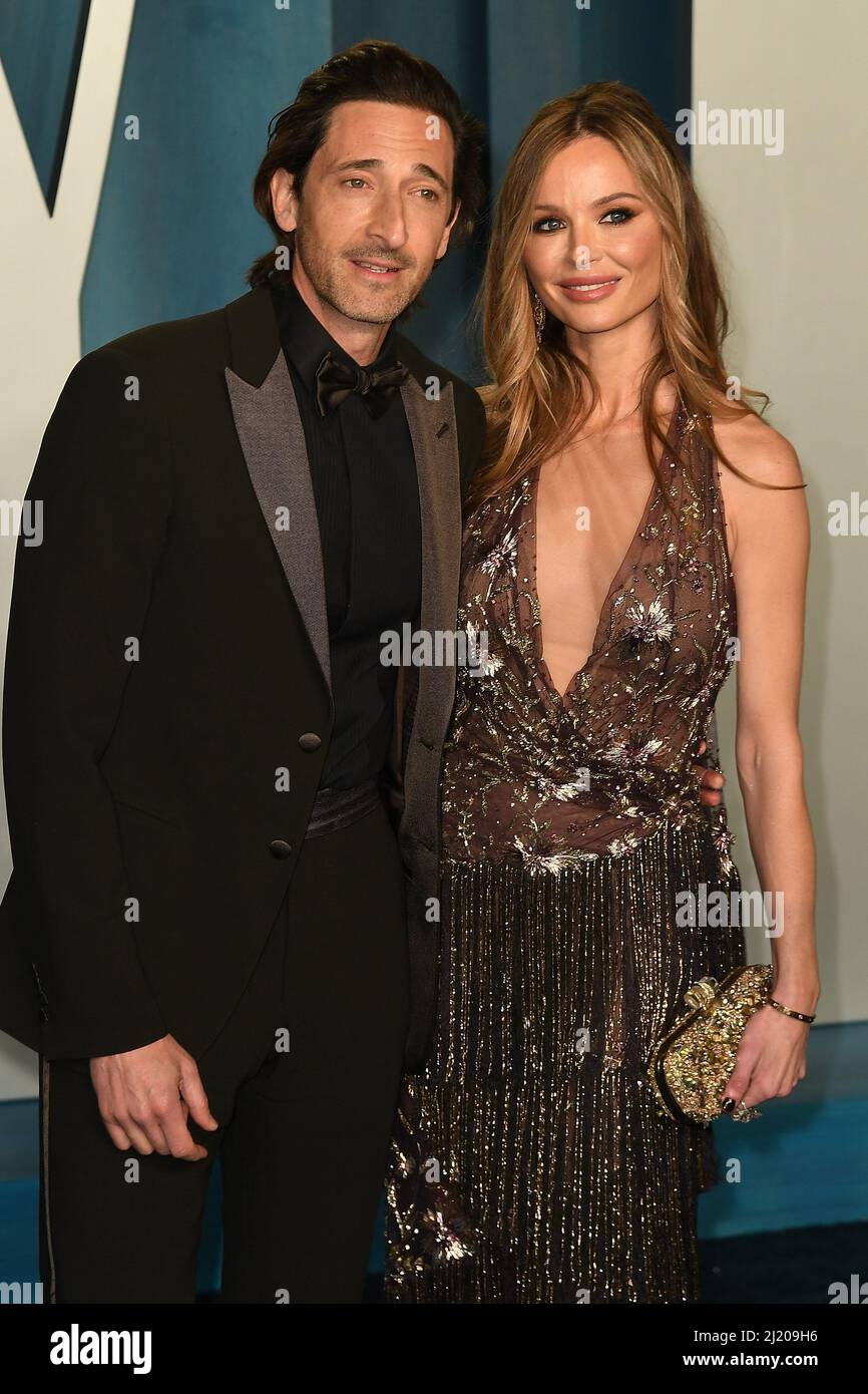 Adrien Brody and Georgina Chapman arrive at the 2022 Vanity Fair Oscar