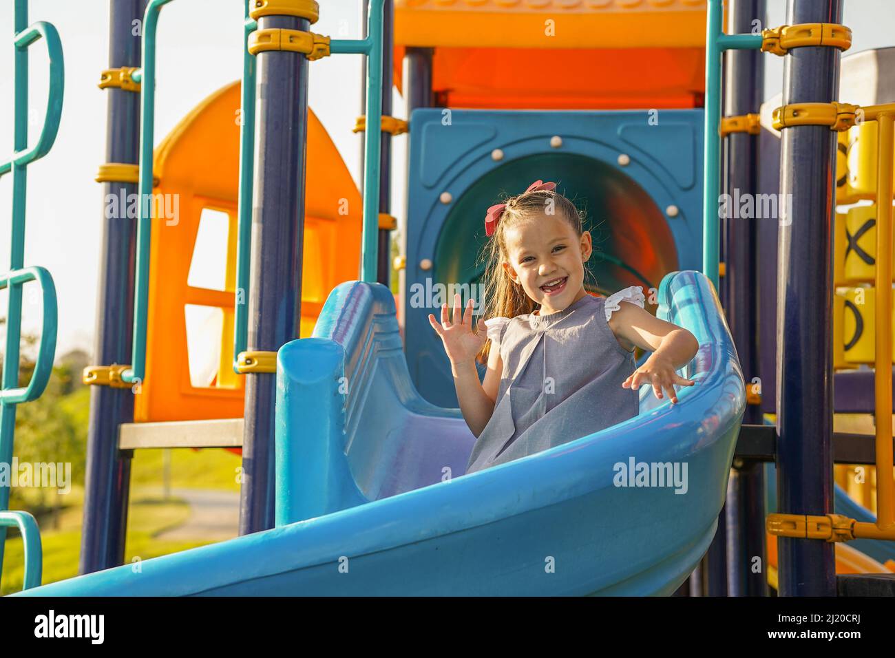 Funny smiling happy girl in the park Stock Photo