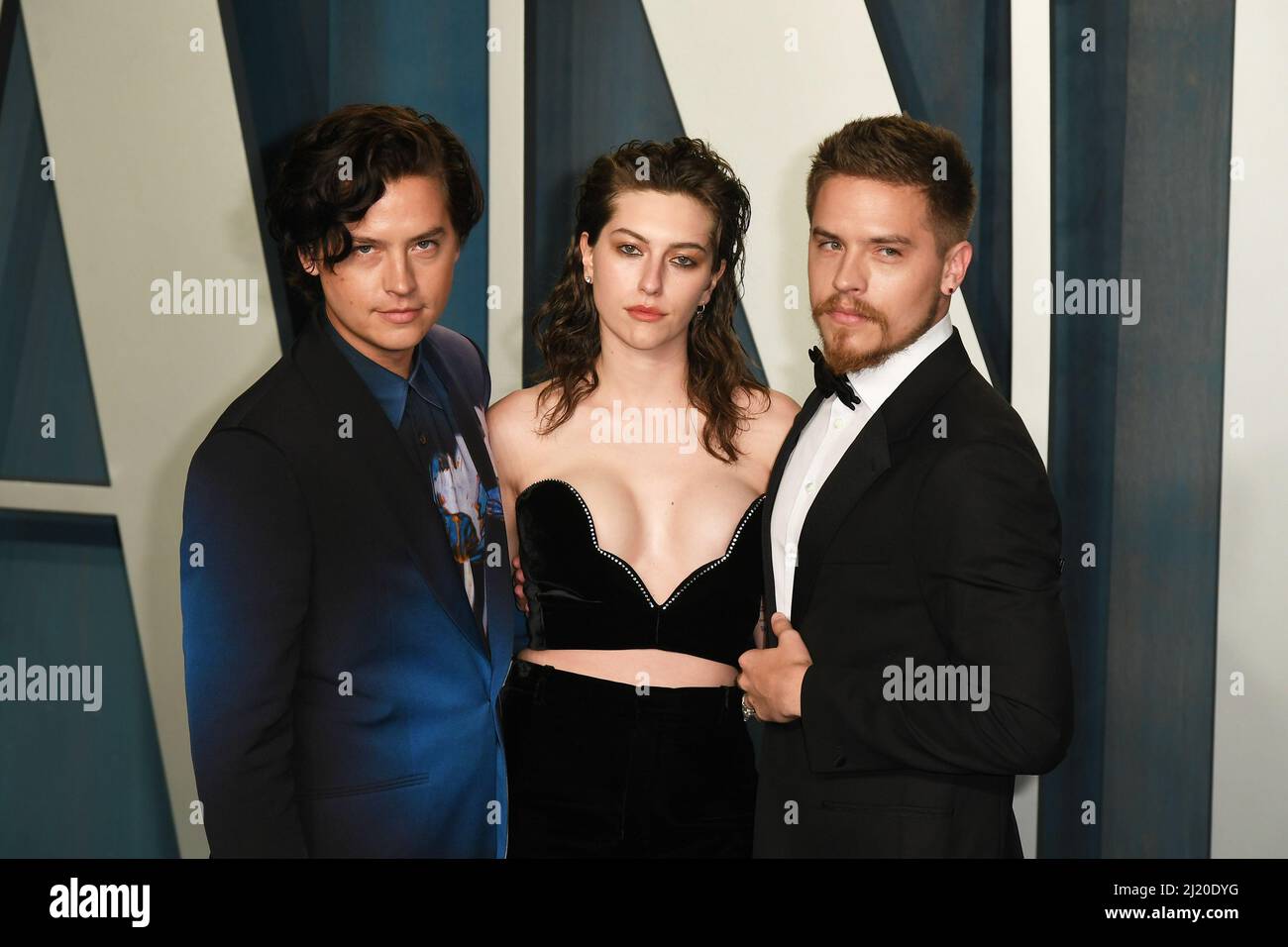 Cole Sprouse, King Princess, and Dylan Sprouse attend the 2022 Vanity Fair Oscar Party at the Wallis Annenberg Center for the Performing Arts on March 27, 2022 in Beverly Hills, California.  Photo: Casey Flanigan/imageSPACE/MediaPunch Stock Photo