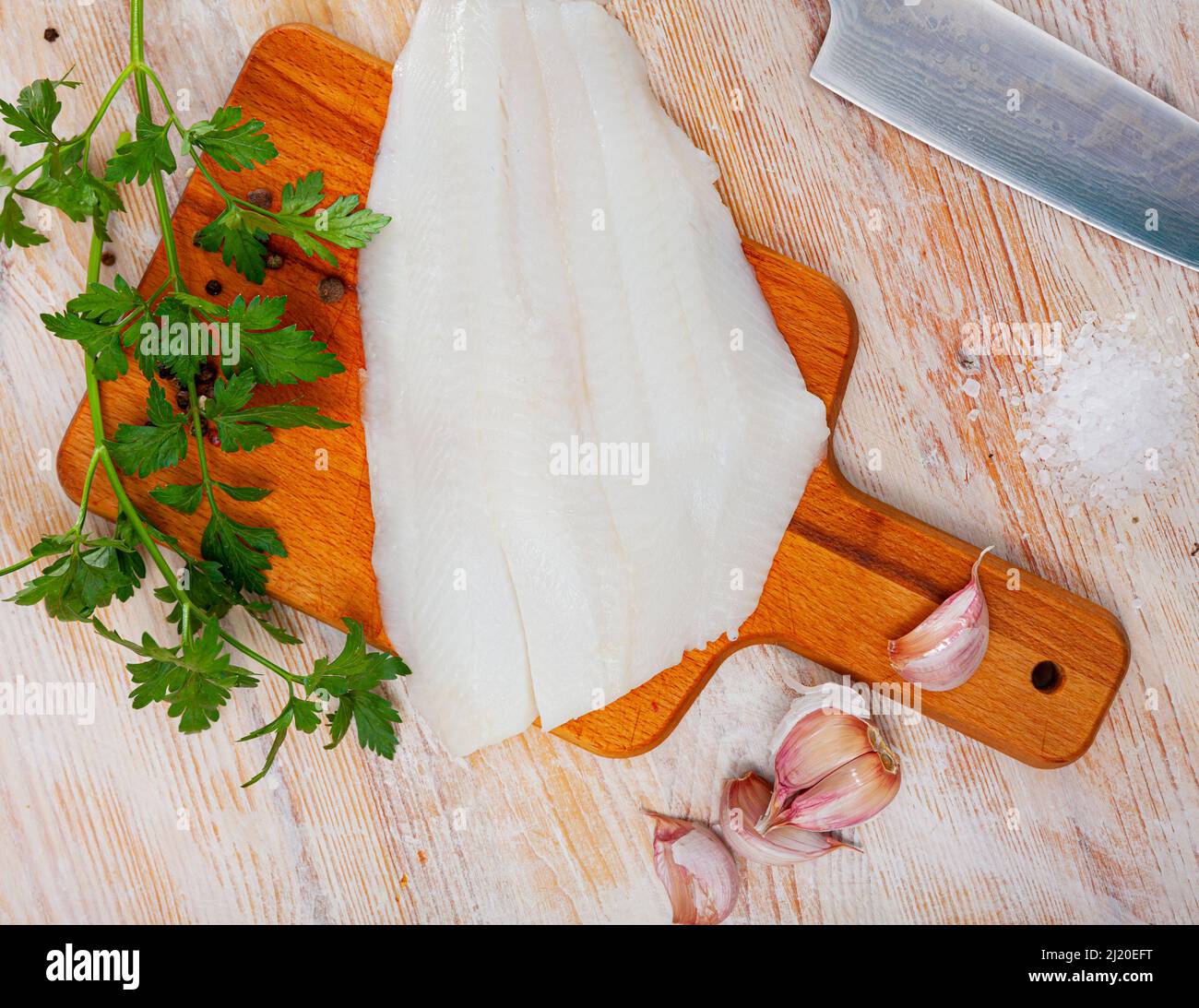 Raw Atlantic halibut fillet with condiments Stock Photo Alamy