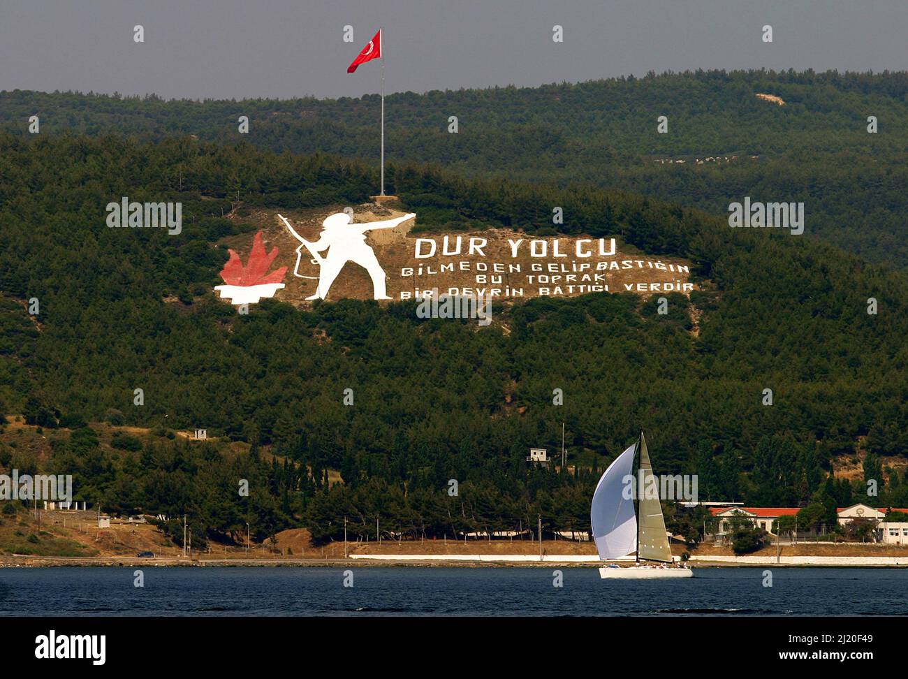 Sailing boat passes through the Canakkale Strait in, Turkey. Stock Photo