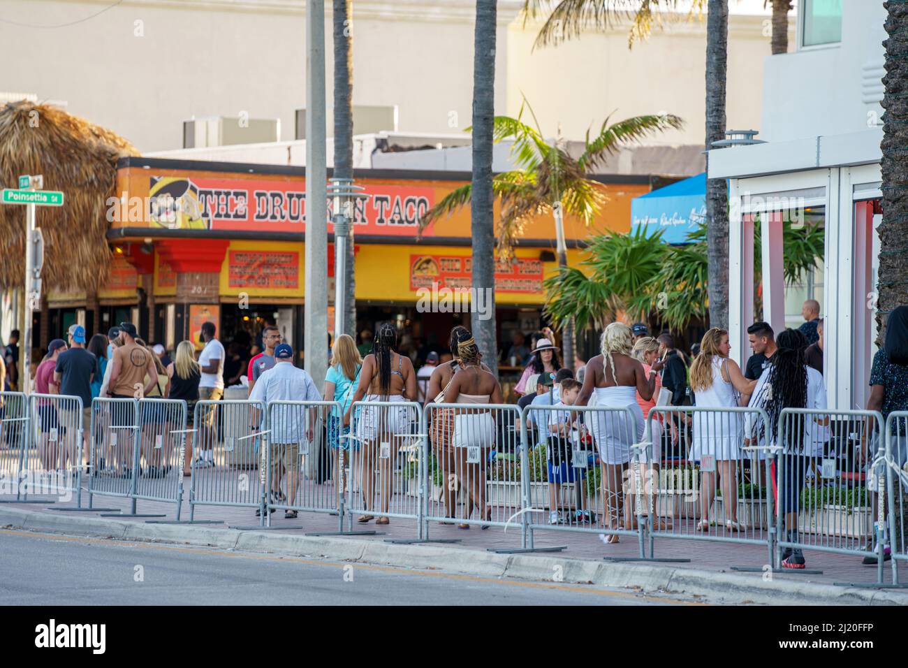 Fort Lauderdale, FL, USA March 27, 2022 People walking along A1A