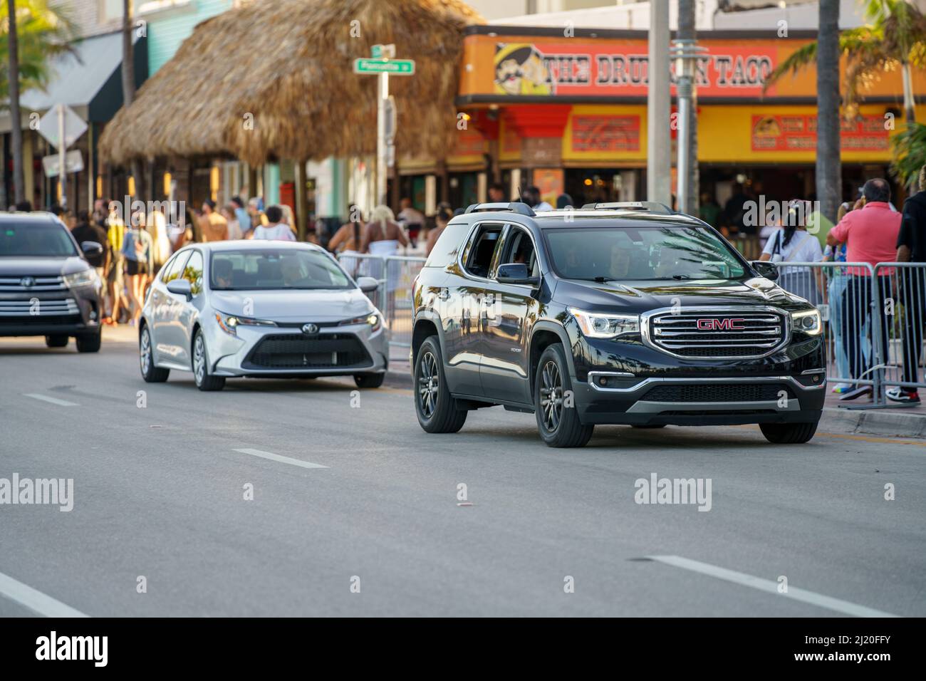 Fort Lauderdale, FL, USA - March 27, 2022: GMC Acadia driving along Fort Lauderdale A1A Stock Photo