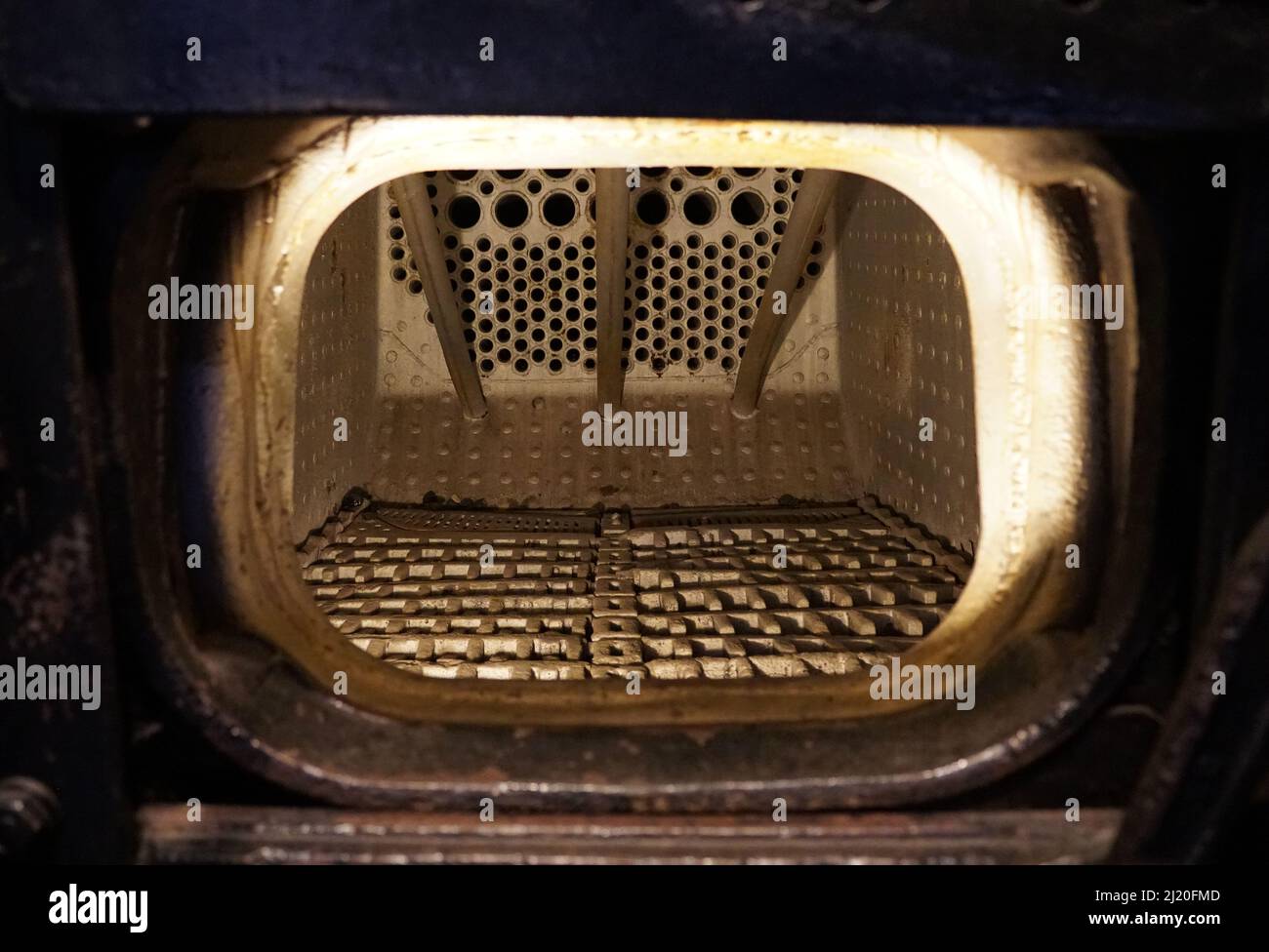 The inside of a firebox, an empty coal burning steam locomotive Stock Photo