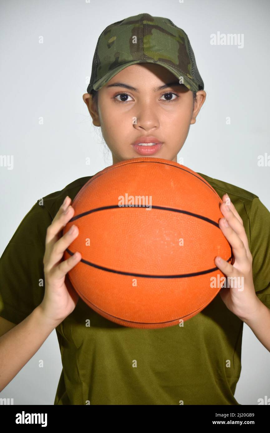 A Female Soldier With Basketball Stock Photo