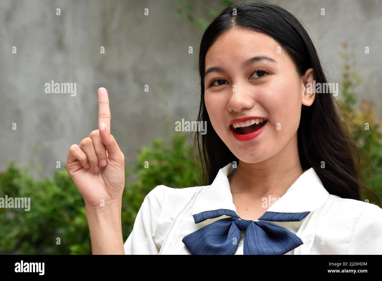 An Asian Woman Having An Idea Stock Photo