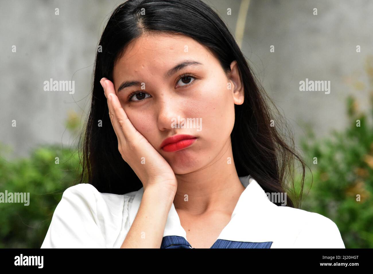 A Sad Disappointed Asian Woman Stock Photo