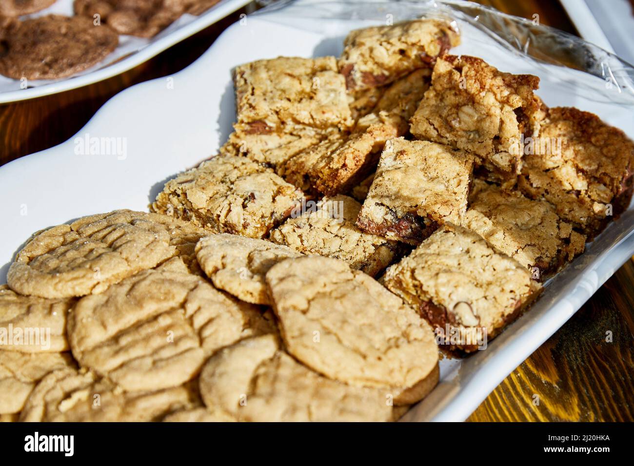 Homemade Peanut Butter Cookies and date bars with shallow depth of field Stock Photo