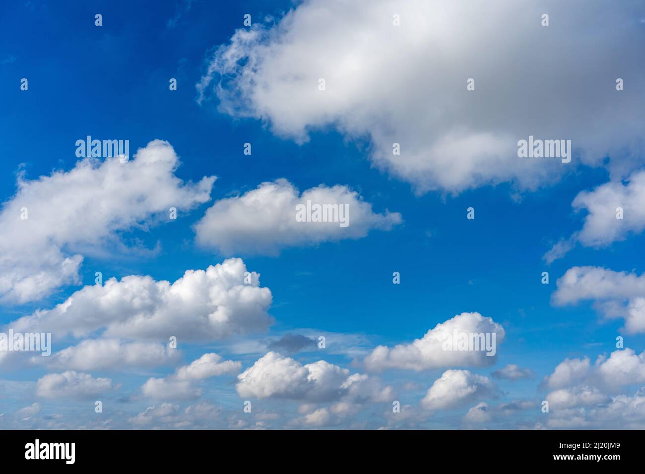 Beautiful blue sky with white cumulus clouds floating Stock Photo - Alamy