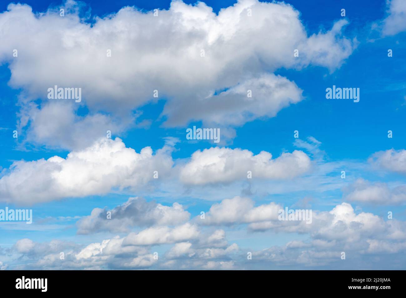 Beautiful blue sky with many white clouds floating Stock Photo - Alamy