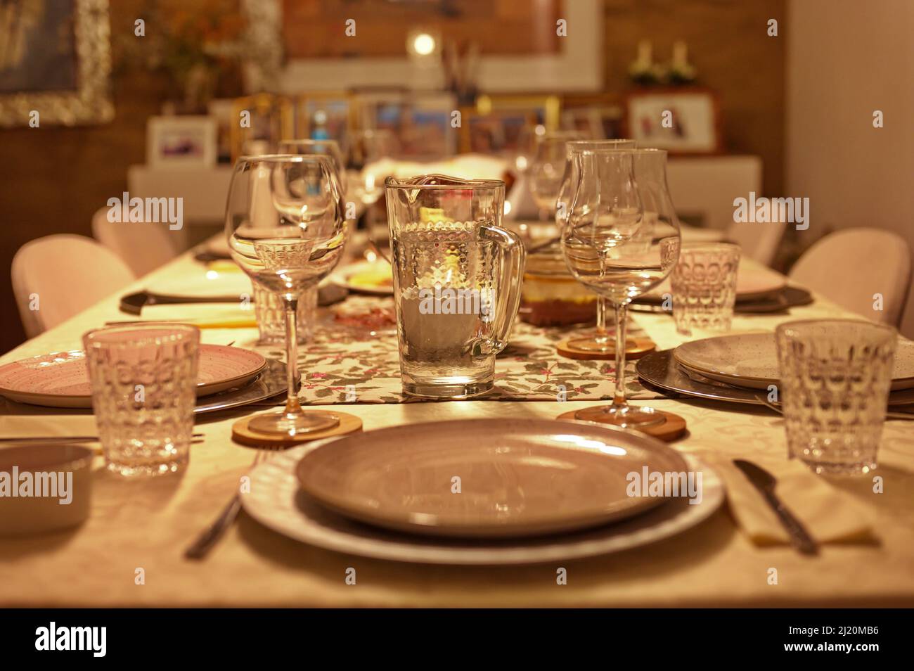 Table setting for dinner in living room Stock Photo
