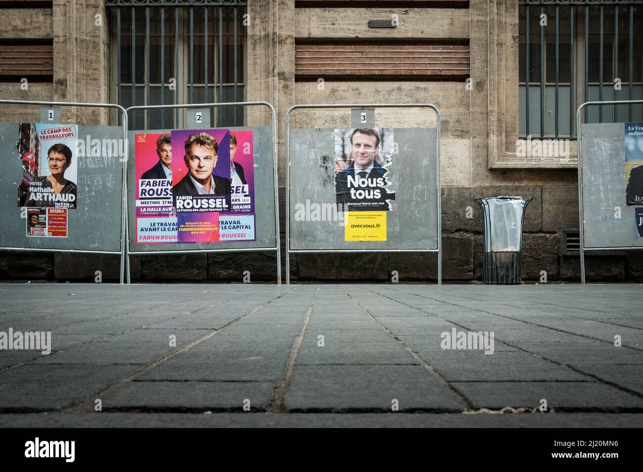 Nathalie ARTHAUD, Fabien ROUSSEL, Emmanuel MACRON. Fifteen days before the first round of the 2022 presidential elections, the official panels are available for the posters of each candidate. Toulouse, France, March 28, 2022. Monday 28th March marks the official beginning of presidential campaign season. The number of candidates running has already been cut down to 12 after a number of figures failed to gather enough parrainages, or signatures of support. Photo by Patrick Batard/ABACAPRESS.COM Stock Photo