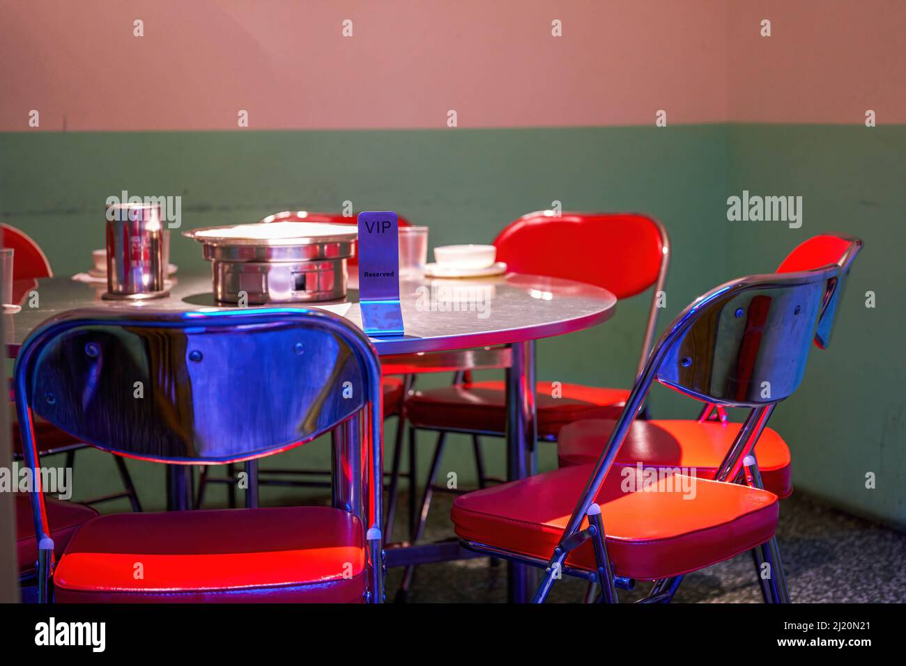 Eighties retro style Chinese restaurant food stall seating Stock Photo