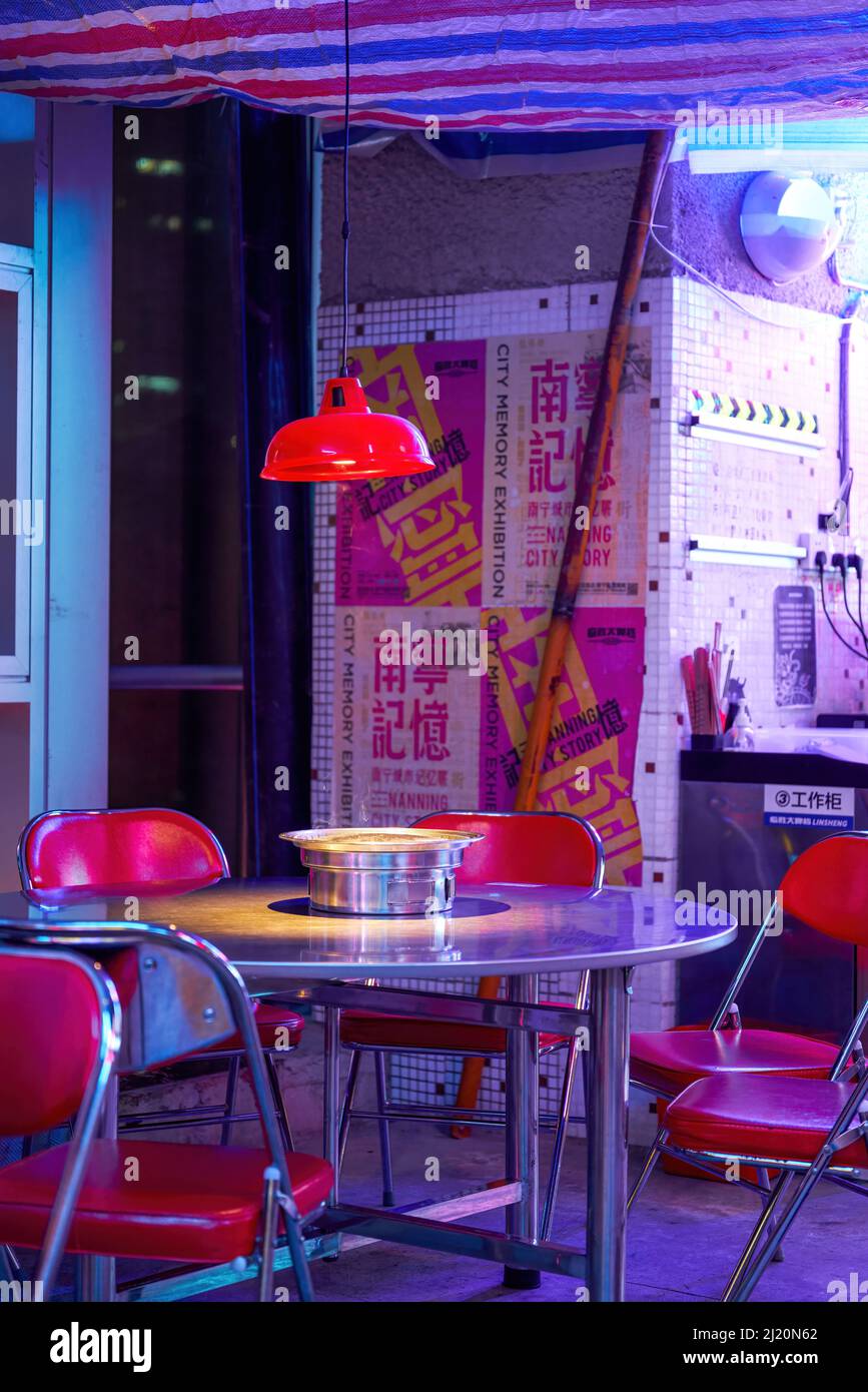 Eighties retro style Chinese restaurant food stall seating Stock Photo