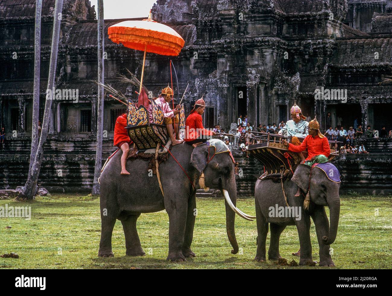 Costumed actors re-enact historic battles for a movie being directed by Prince Norodom Sihanouk, at Angkor Wat, Cambodia, 1966 Stock Photo