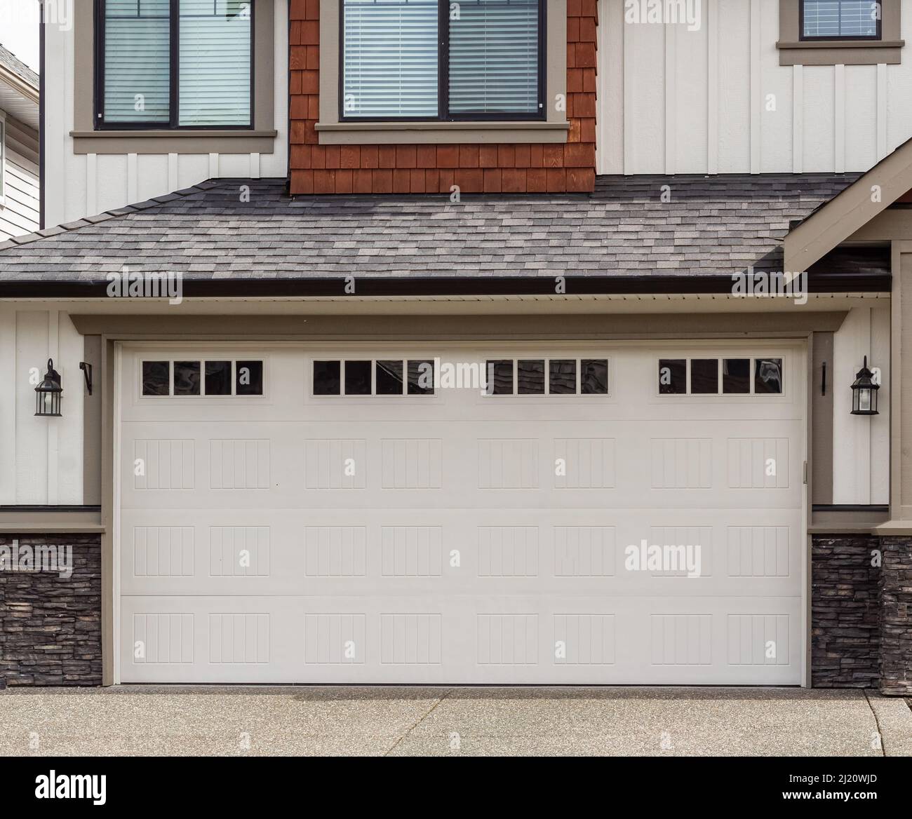 Garage door in Vancouver, Canada. Garage door in luxury house. Street
