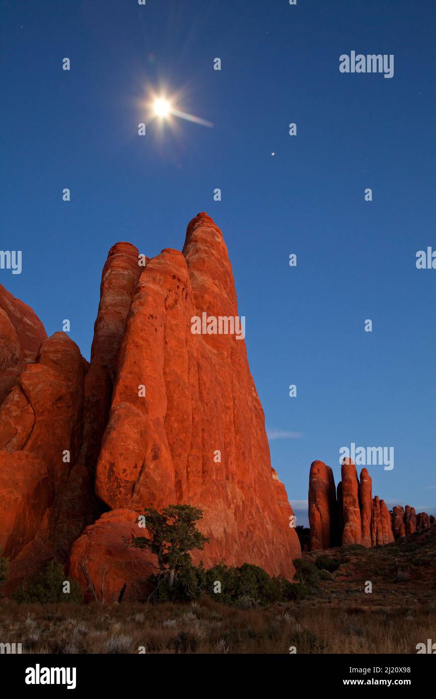 Moonrise over the Fins in Arches National Park, Utah, USA. Novemer. Stock Photo