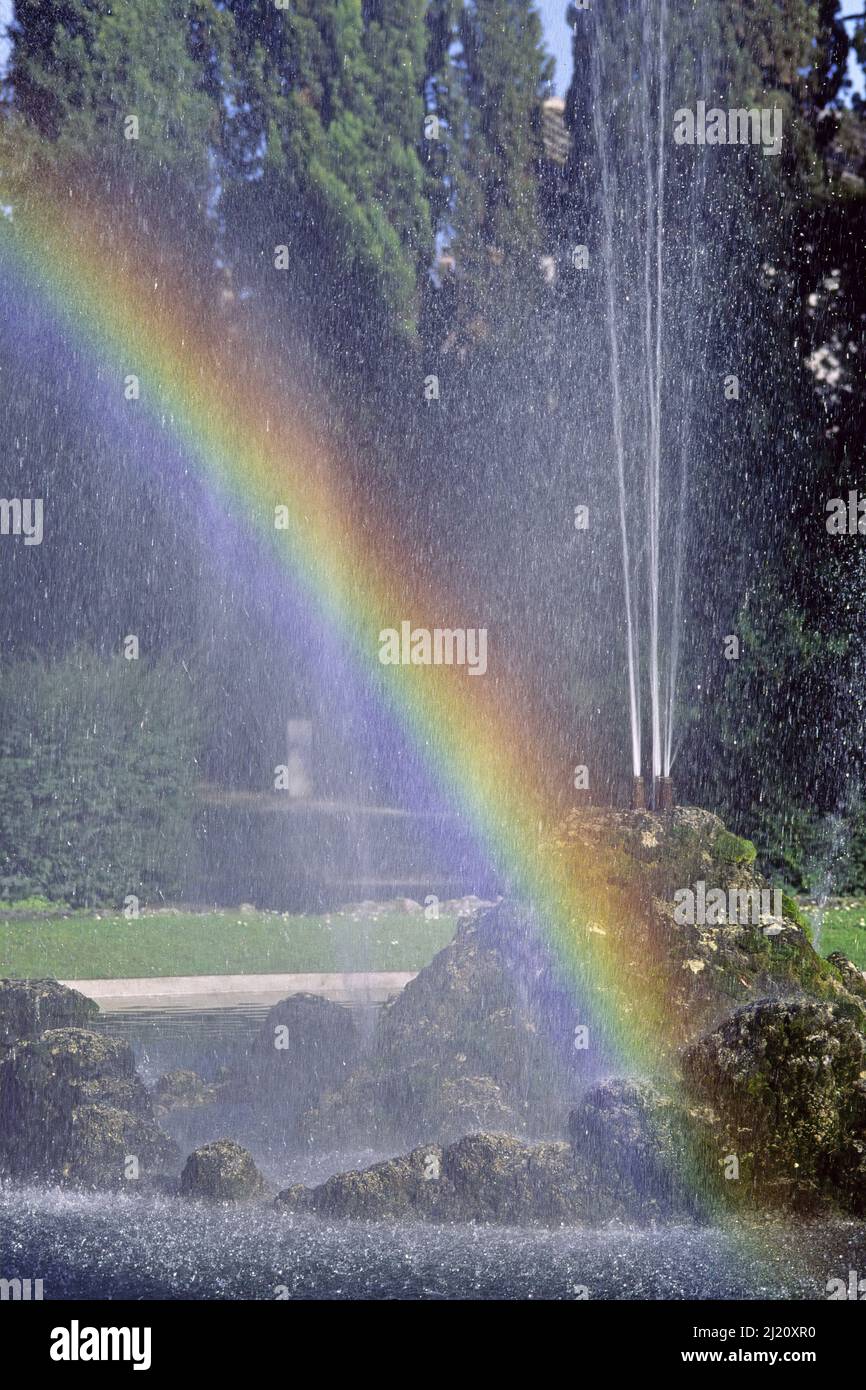 Rainbow in the water games of a fountain in a park Stock Photo