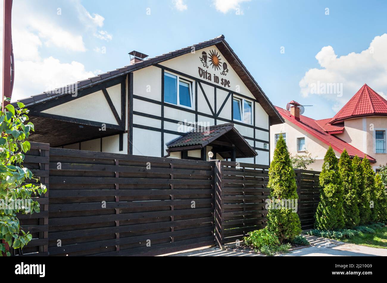 Kyiv, Ukraine - July 3, 2021: Luxury half-timbered house in the Osokorky area on the left bank of Kyiv, the capital of Ukraine. Fachwerk style. The in Stock Photo
