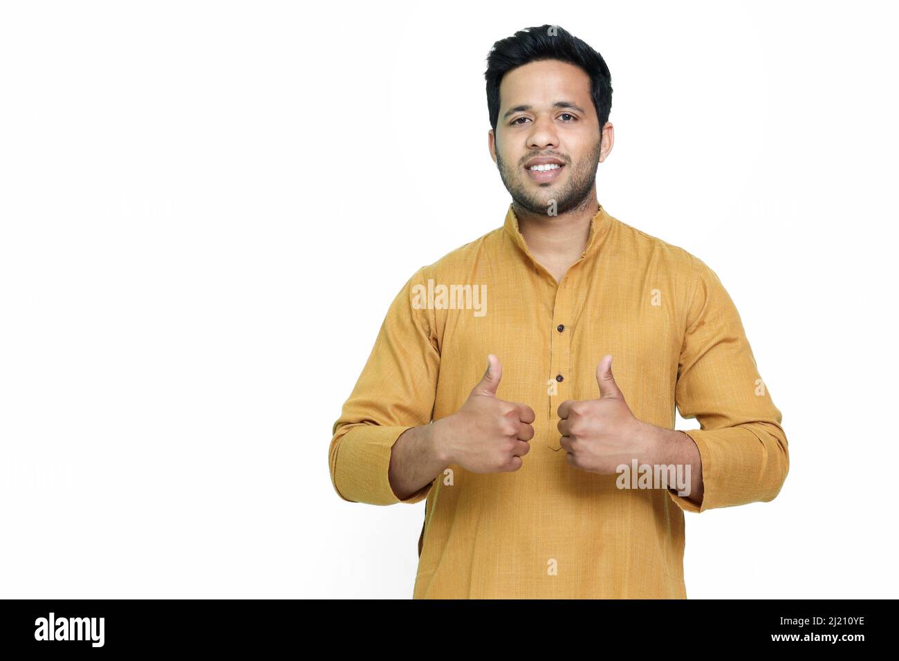 Attractive Young Indian Man Showing Thumbs Up Sign, Isolated on White