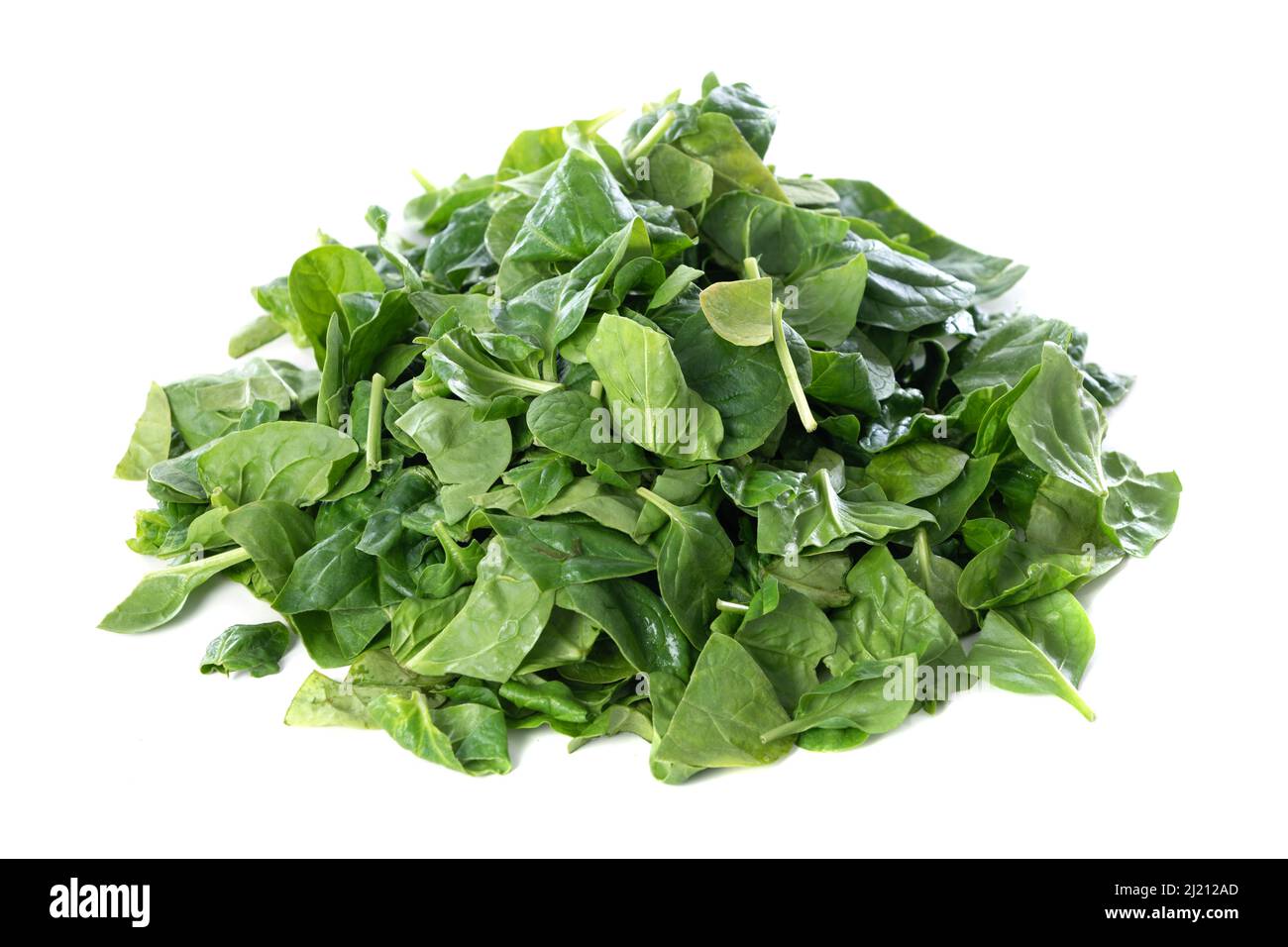 Pile of fresh green baby spinach leaves isolated on white background ...